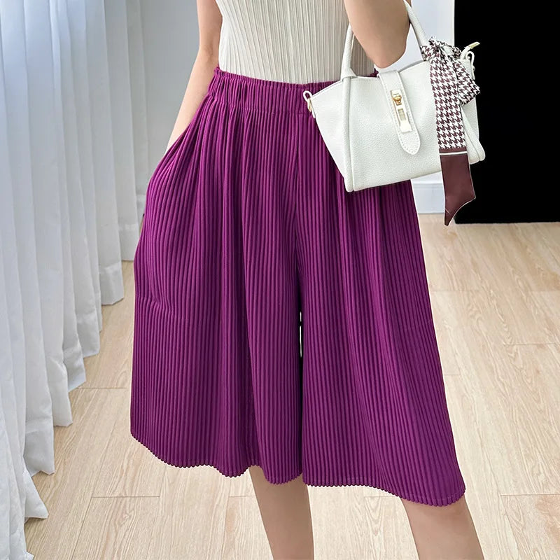 Miyake pleated casual mid-pants women 2023 new summer solid color loose large size drape high waist five-point shorts sweatpants